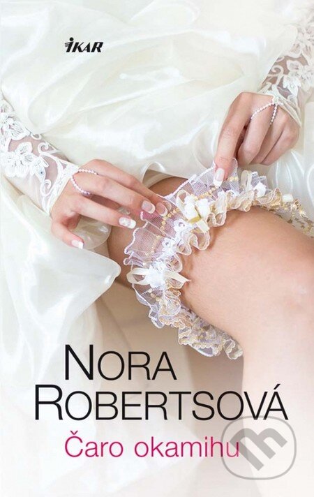 Kniha: Čaro okamihu (Nora Roberts). Ikar, 2013 Kniha: Čaro okamihu (Nora Roberts). Ikar, 2013