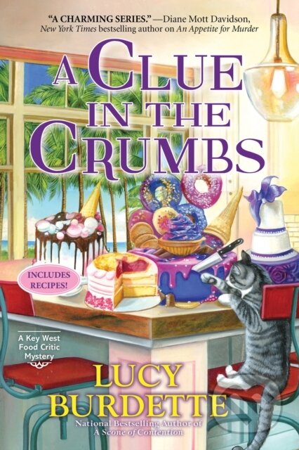 Kniha: A Clue in the Crumbs (Lucy Burdette). , 2025 Kniha: A Clue in the Crumbs (Lucy Burdette). , 2025