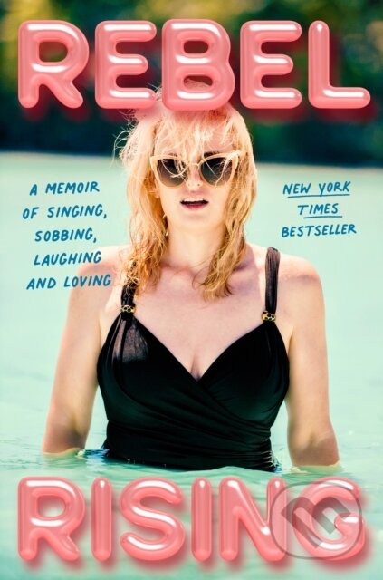 Kniha: Rebel Rising (Rebel Wilson). HarperCollins, 2025 Kniha: Rebel Rising (Rebel Wilson). HarperCollins, 2025