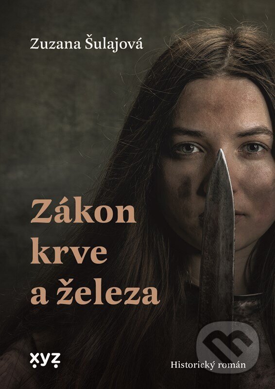 Kniha: Zákon krve a železa (Zuzka Šulajová). XYZ, 2025 Kniha: Zákon krve a železa (Zuzka Šulajová). XYZ, 2025