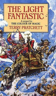 Kniha: The Light Fantastic (Terry Pratchett). Corgi Books, 1986